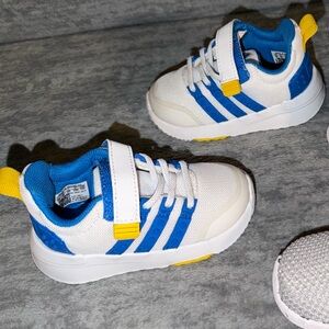 adidas Kids White and Blue Sneakers with Yellow Accents